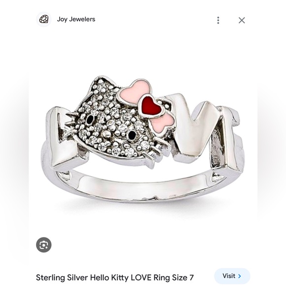 Jewelry - Sterling Silver Hello Kitty LOVE ring features Swarovski accents and a bow